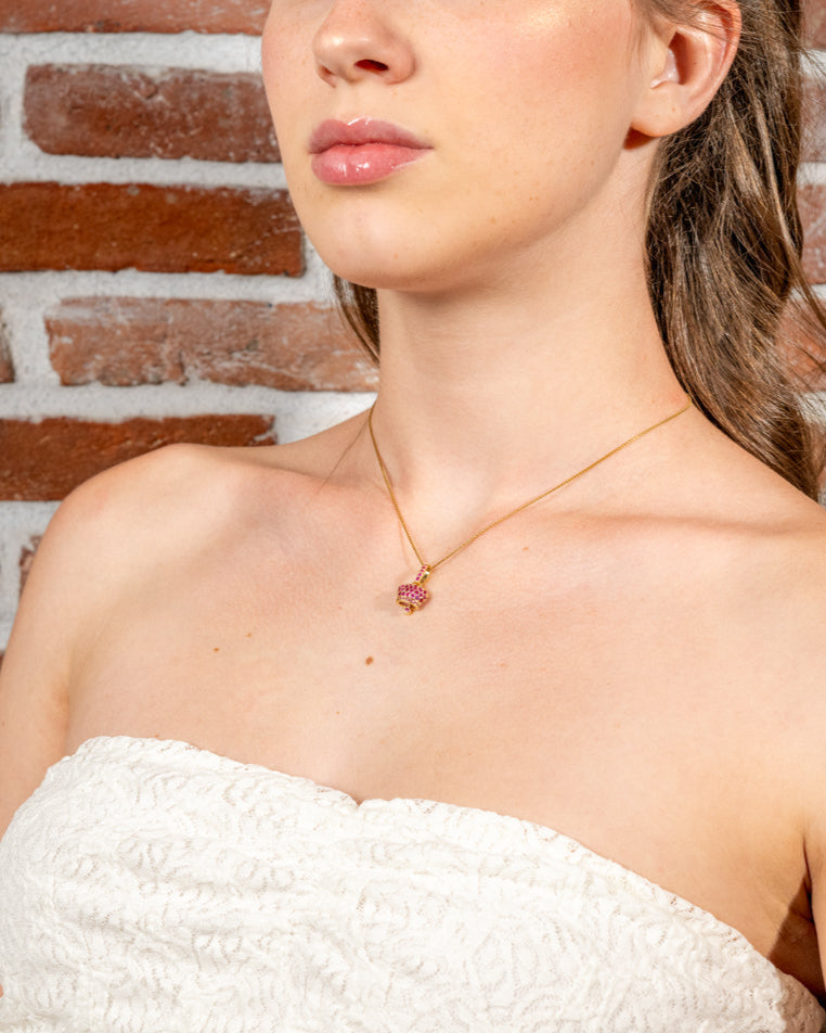 Capri Bell – Girocollo con campanella e cristalli magenta